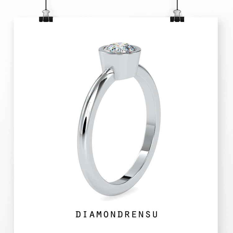 Beautiful bezel setting ring with a single diamond for a minimalist look.