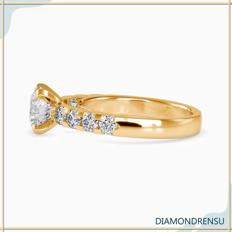 Rose gold round cut engagement ring with 4 prong setting and handmade craftsmanship.