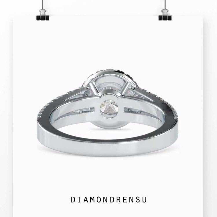 Round diamond with halo and pave engagement ring settings for a timeless design.