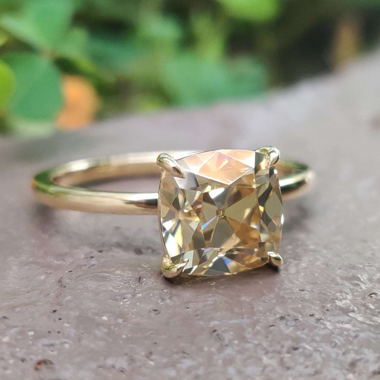 A dazzling moissanite solitaire ring in a classic claw prong setting, perfect for elegant engagements.