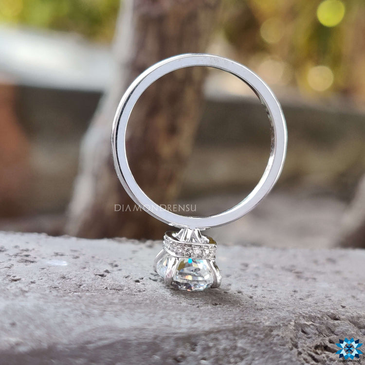Sophisticated 4 prong diamond ring designed to enhance its brilliance.