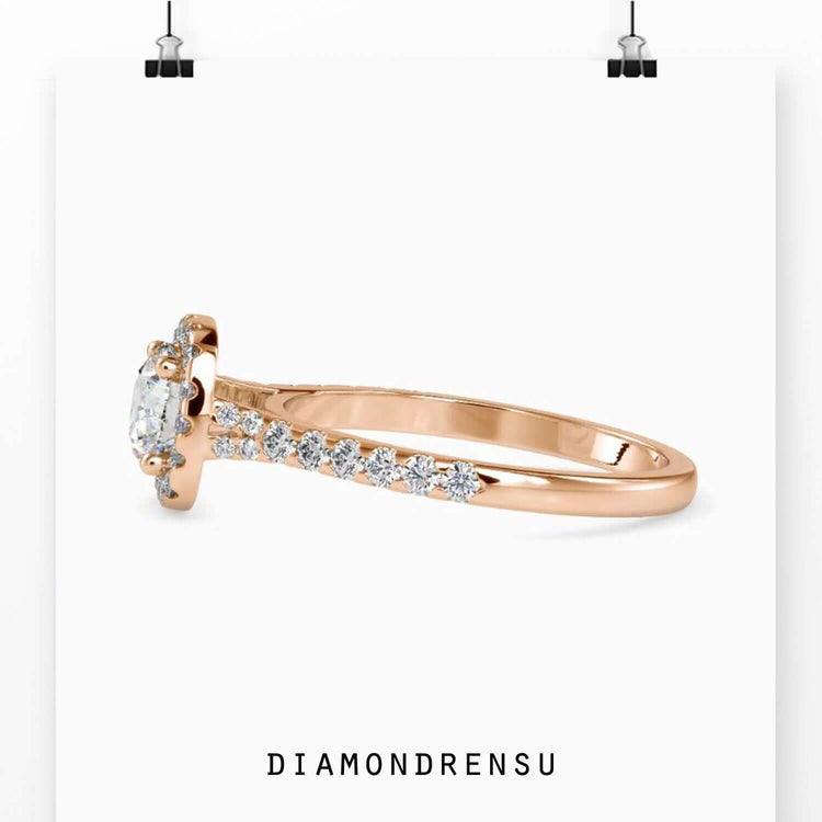 Lab grown diamond engagement ring with a round halo setting.