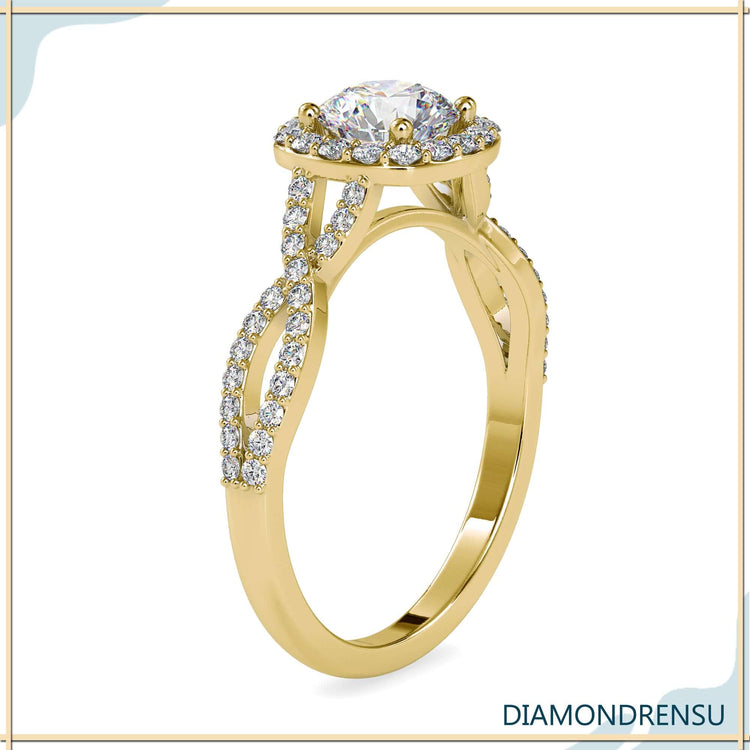 Pave engagement ring featuring a twisted design and round cut diamond.