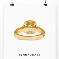Timeless round brilliant cut diamond ring with a delicate prong setting.