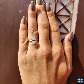 An elegant oval shaped engagement ring featuring a timeless charm.