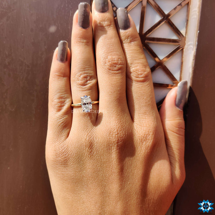 An elegant oval shaped engagement ring featuring a timeless charm.