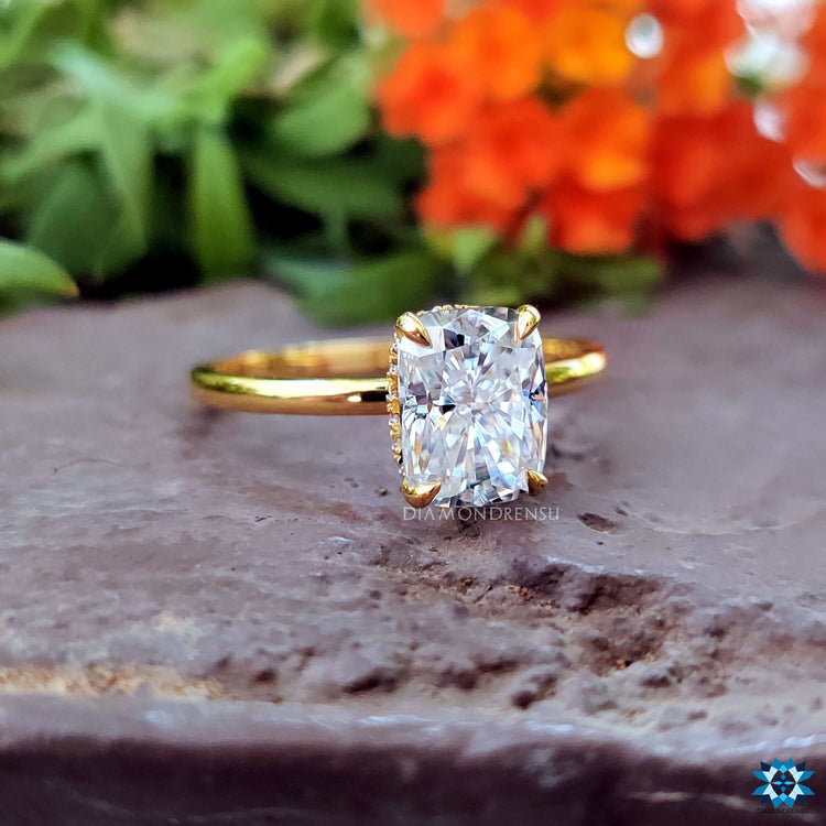 A classic cushion cut ring with a brilliant moissanite stone and a handmade touch.