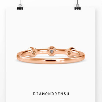 Round diamond gold band with bezel setting, IGI certified diamonds