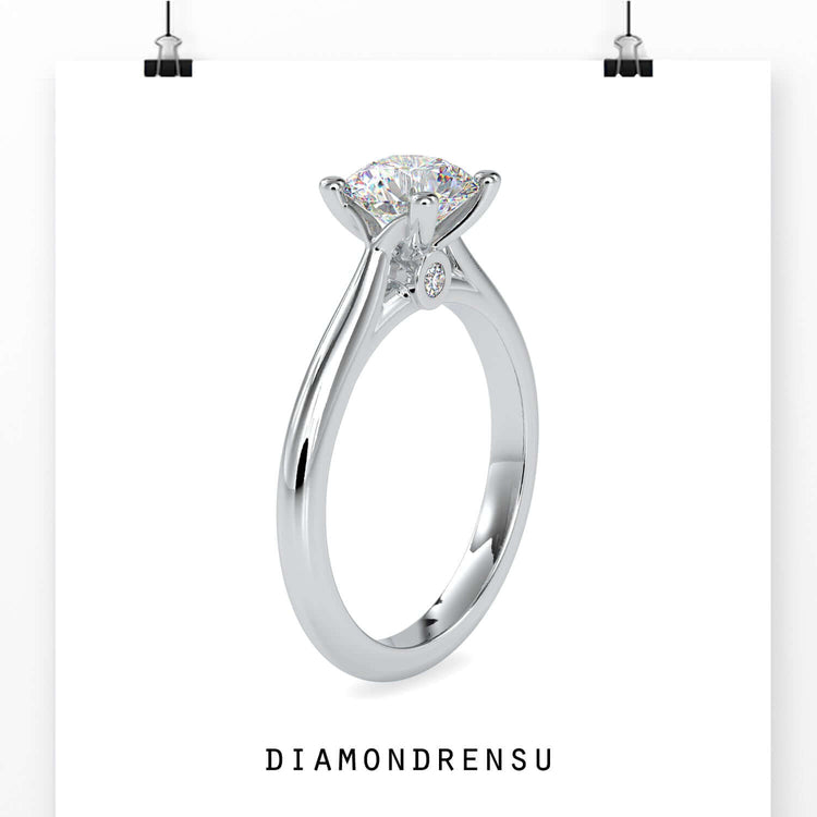 Diamondrensu round diamond engagement ring with a cathedral setting, blending vintage elegance with modern craftsmanship.