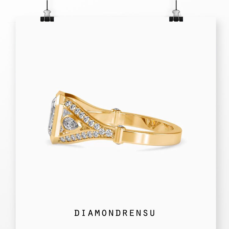 Lab grown diamond ring with an emerald cut diamond and bezel setting