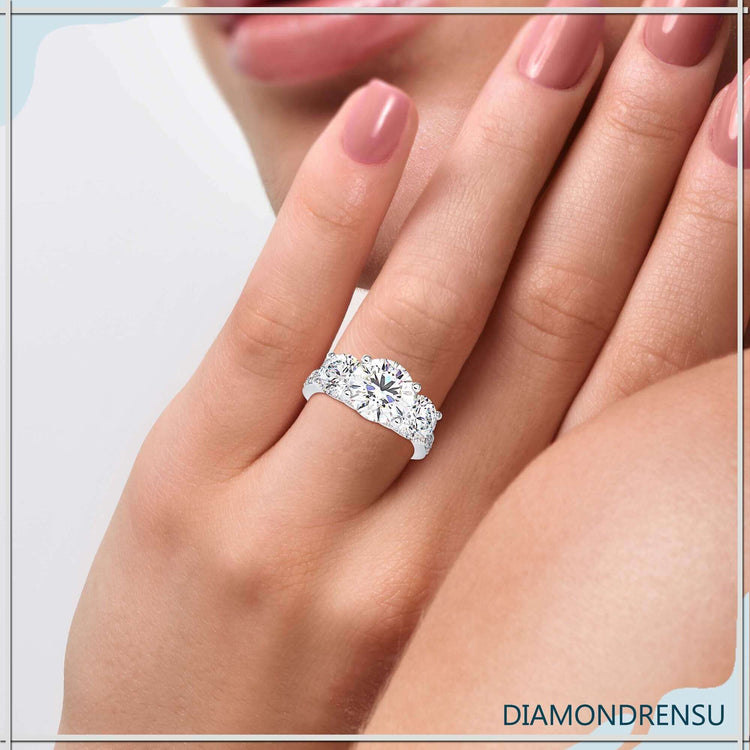 2 carat round diamond ring in an elegant pave setting.