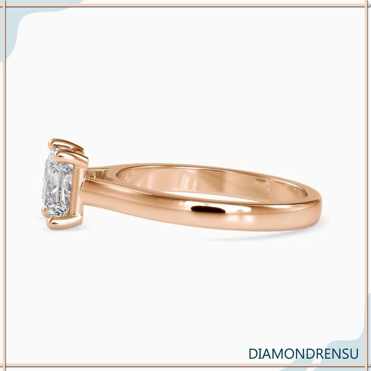 Princess solitaire ring with a solitaire setting and a princess cut diamond for a modern look.