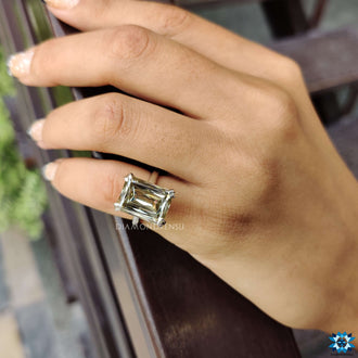 A vibrant yellow moissanite ring with intricate detailing, ideal for adding a touch of luxury.