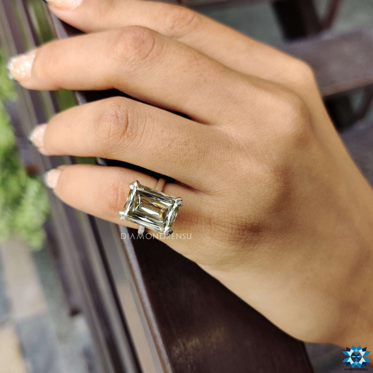 A vibrant yellow moissanite ring with intricate detailing, ideal for adding a touch of luxury.