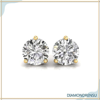 Beautiful 3 prong diamond earrings in a martini setting, crafted with handmade jewelry.