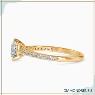 Round engagement ring with a pave setting and cathedral ring style, perfect for proposals.