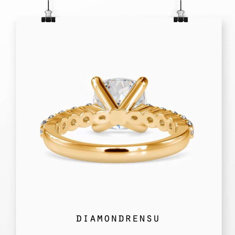 4 prong diamond ring with oval cut diamond and pave ring setting