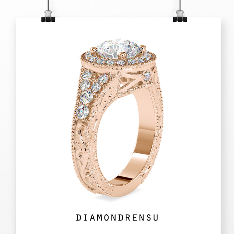 2 carat round cut diamond ring with a split shank for added brilliance.