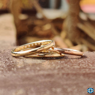 Stacked wedding band with round moissanite and handmade design.