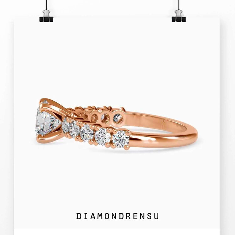 Classic round pave diamond ring with a 4 prong engagement setting for maximum shine.