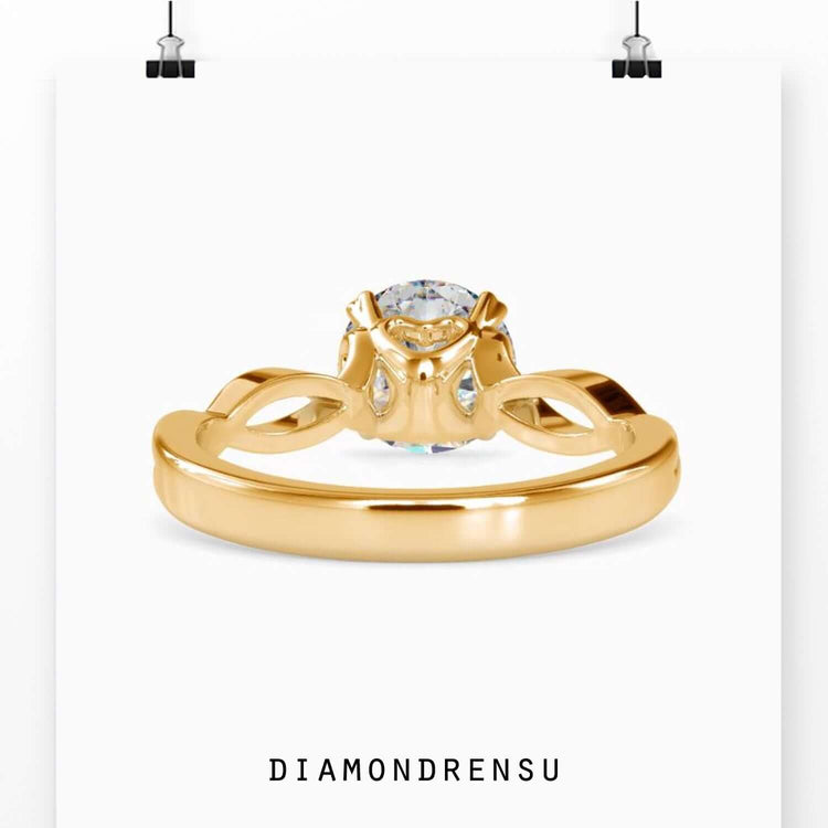 Twisted solitaire engagement ring featuring a unique design and sparkle.