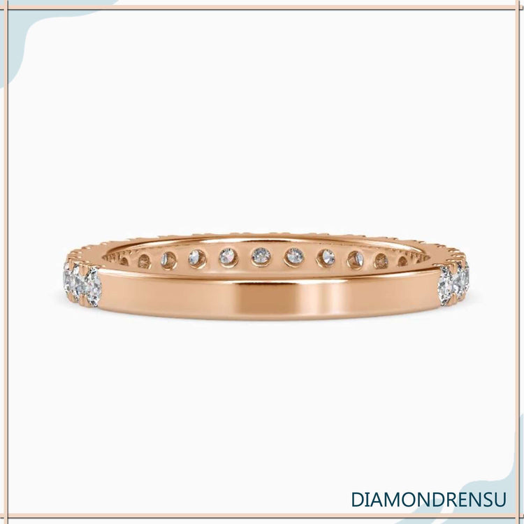 Diamond round band with a semi eternity wedding design and pave setting.