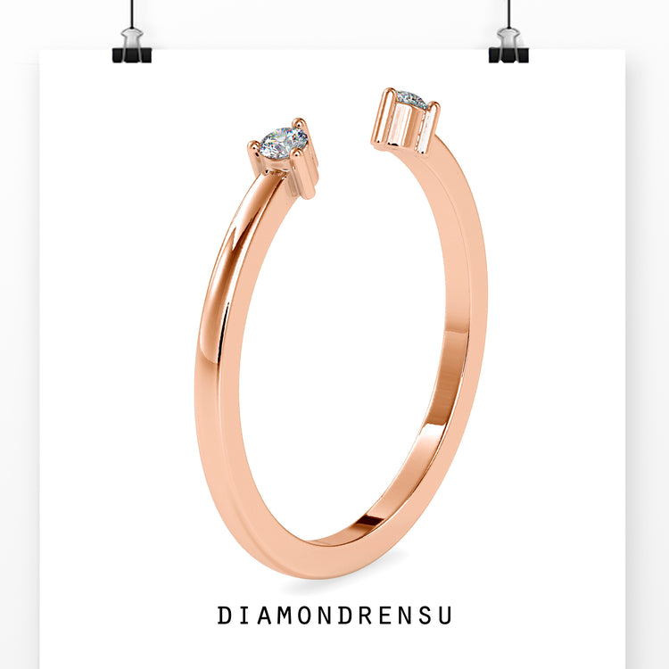 3 prong ring settings on an open band ring with a modern cuff style.