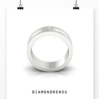 Handmade jewelry featuring a round diamond band for men.
