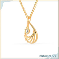 The diamond teardrop pendant shines with brilliant clarity.