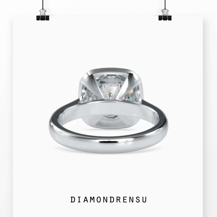 Elegant channel setting ring with a cushion cut halo for a luxurious look.