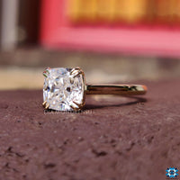 Solitaire cushion cut engagement ring for a classic look.