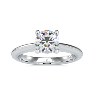 Round solitaire engagement ring with a stunning lab-grown diamond, featuring a knife edge band for a sleek design.