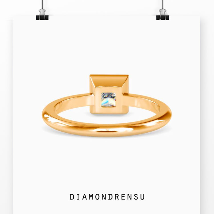 Elegant bezel set princess cut engagement ring for a timeless look.