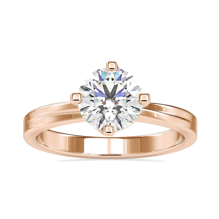 4 prong diamond ring with a secure and stylish round diamond.
