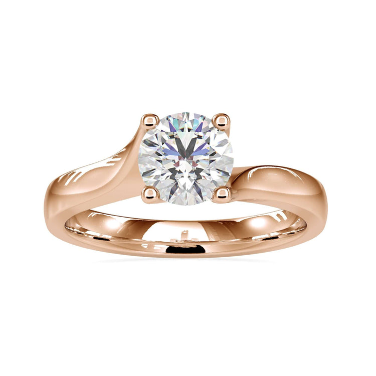 Bypass solitaire engagement ring in gold with lab grown diamond.