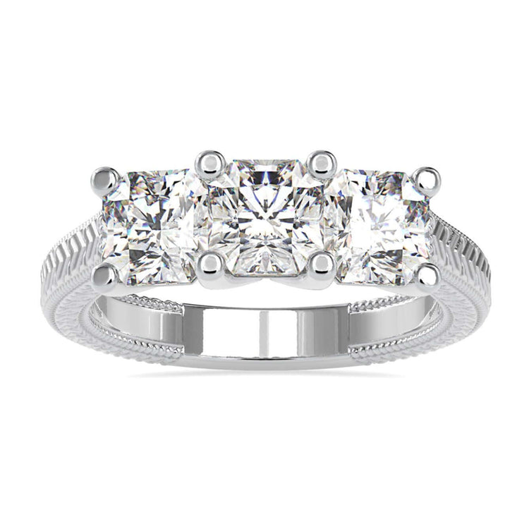 Three stone engagement ring diamond with radiant cut in prong setting.