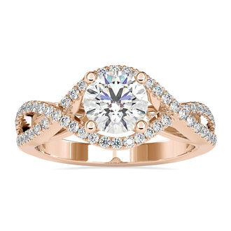 Round diamond engagement ring with a 2 carat round diamond in a twisted solitaire design.
