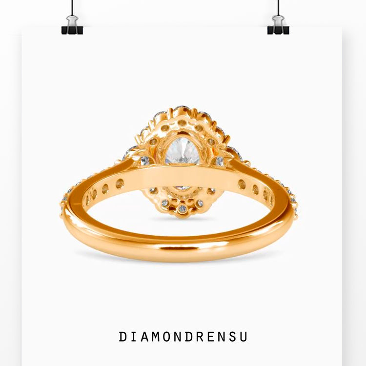 Oval engagement ring with pave ring setting in white gold band