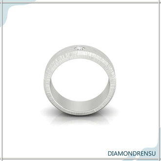 Round cut Lab Grown Diamond set in flush setting.
