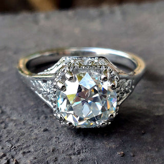 Art Deco engagement ring with intricate detailing, showcasing a stunning vintage design.