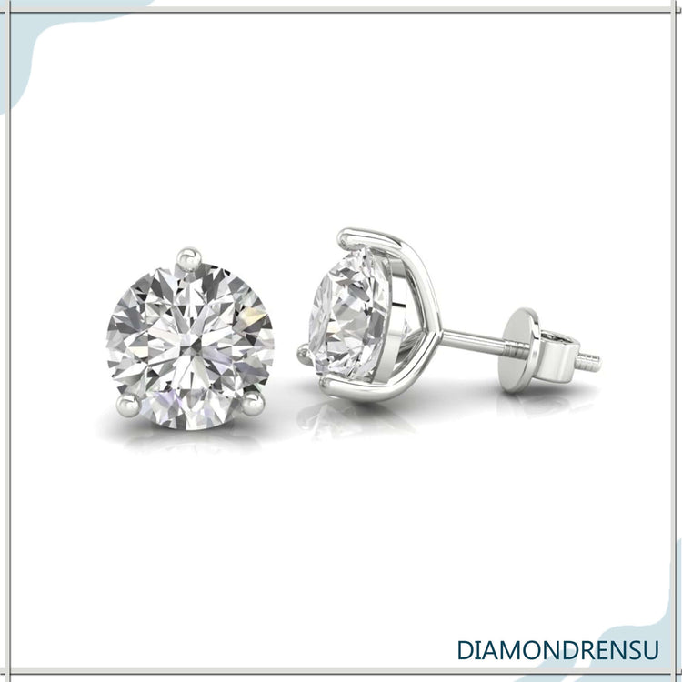 Timeless martini stud earrings with round diamonds, perfect for a minimalist look.