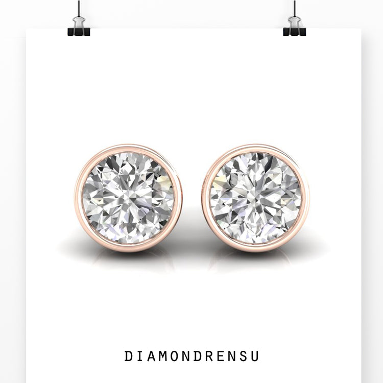 Timeless bezel set stud earrings, perfect for a minimalist and elegant style.