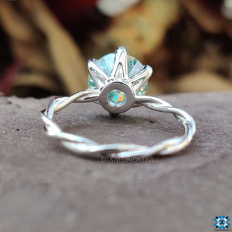 Twisted moissanite engagement ring with brilliant craftsmanship.
