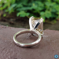 A double prong design ring, offering a secure and stylish setting for the centre stone.