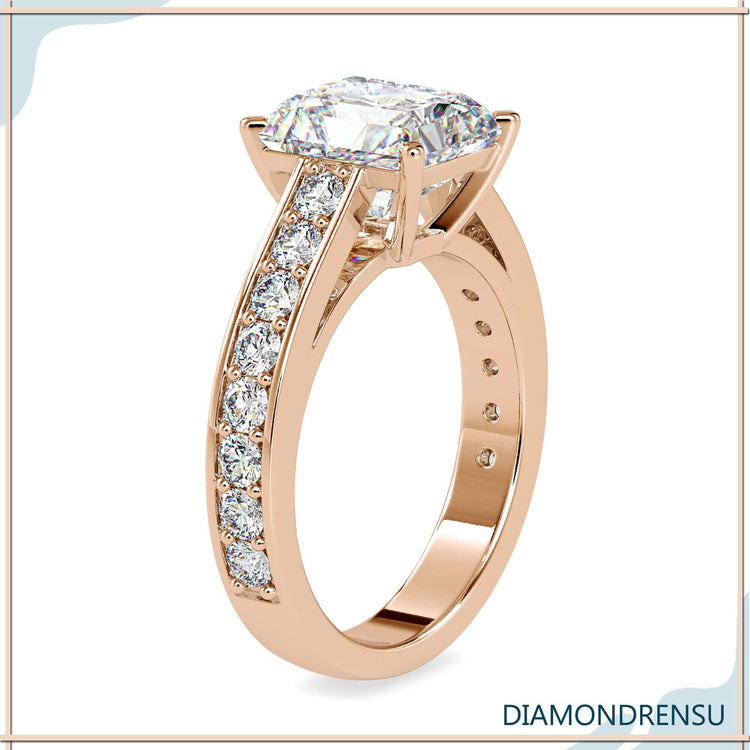 A 4-prong ring with a channel set ring band, showcasing an elegant and secure design.