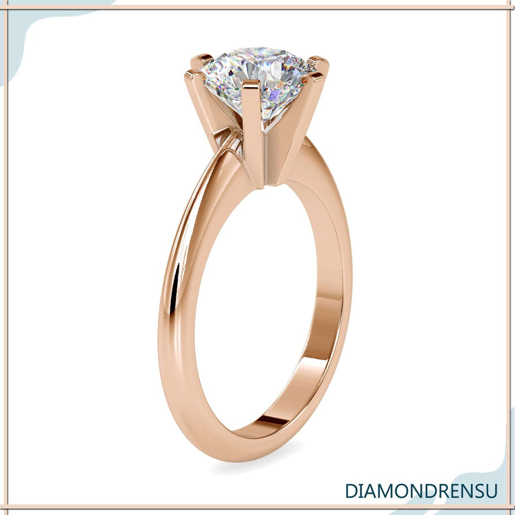 2 carat round diamond ring in yellow gold with solitaire design