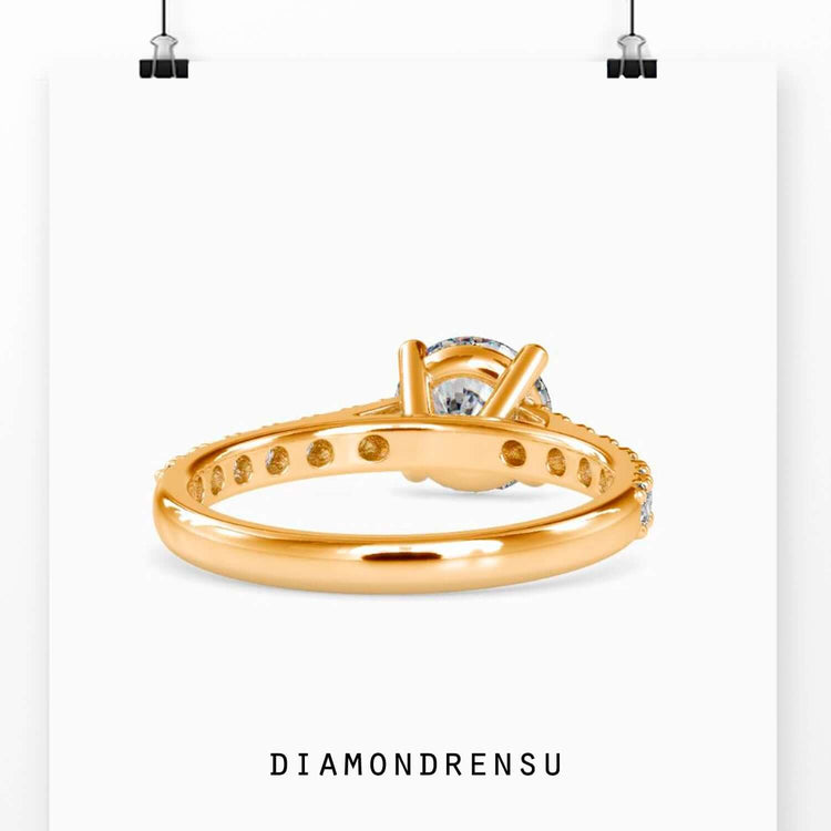 Pave engagement ring in a classic cathedral setting, featuring a round diamond and elegant design.