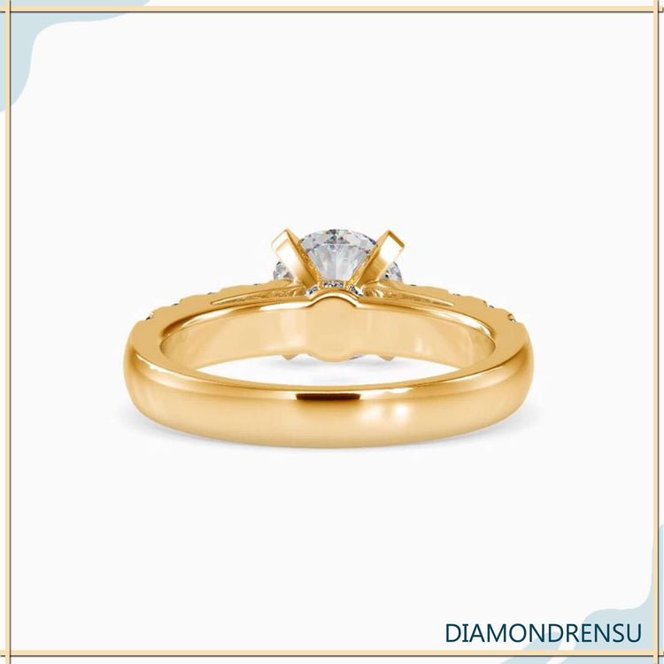 Hidden halo ring featuring a lab grown diamond and intricate pave ring settings.