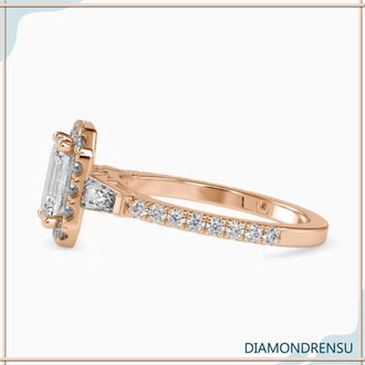 Baguette engagement ring setting with emerald cut center diamond.