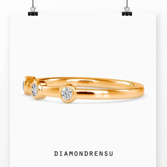 Bezel wedding band with handmade craftsmanship in rose gold